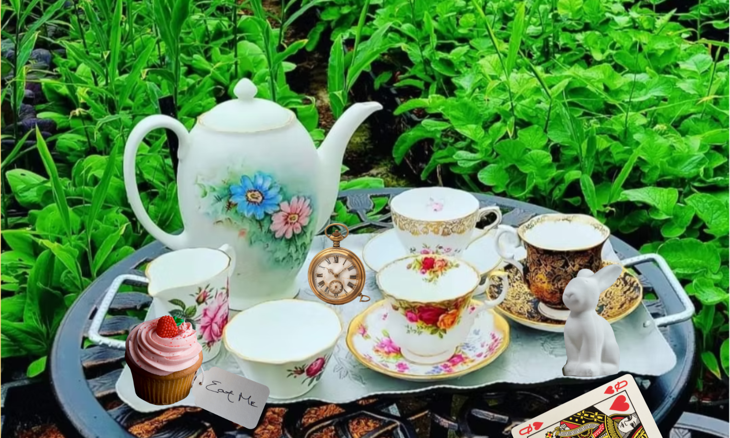 A table with tea setting and Alice themed items